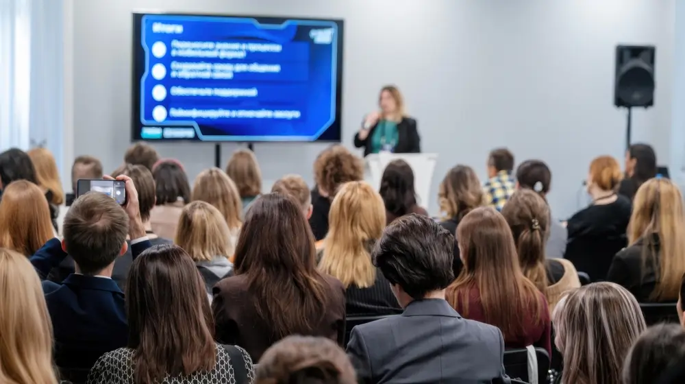 Police recruits attending a briefing session about training and career routes.